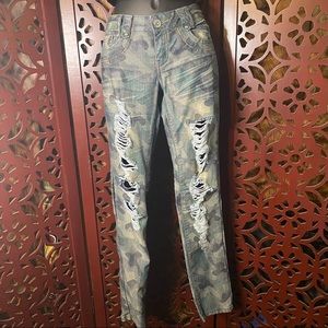 Ripped camouflage denim jeans